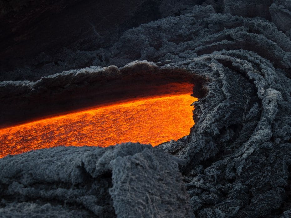 Eruptive activity on Etna volcano where lava flows down towards the Move valley on March 27, 2017. V