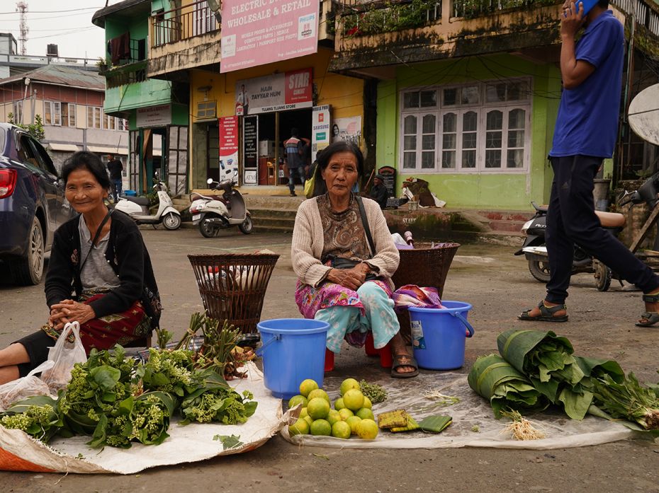 Women selling fresh fruits and herbs at Lungdai Bazaar in Mizoram.
 