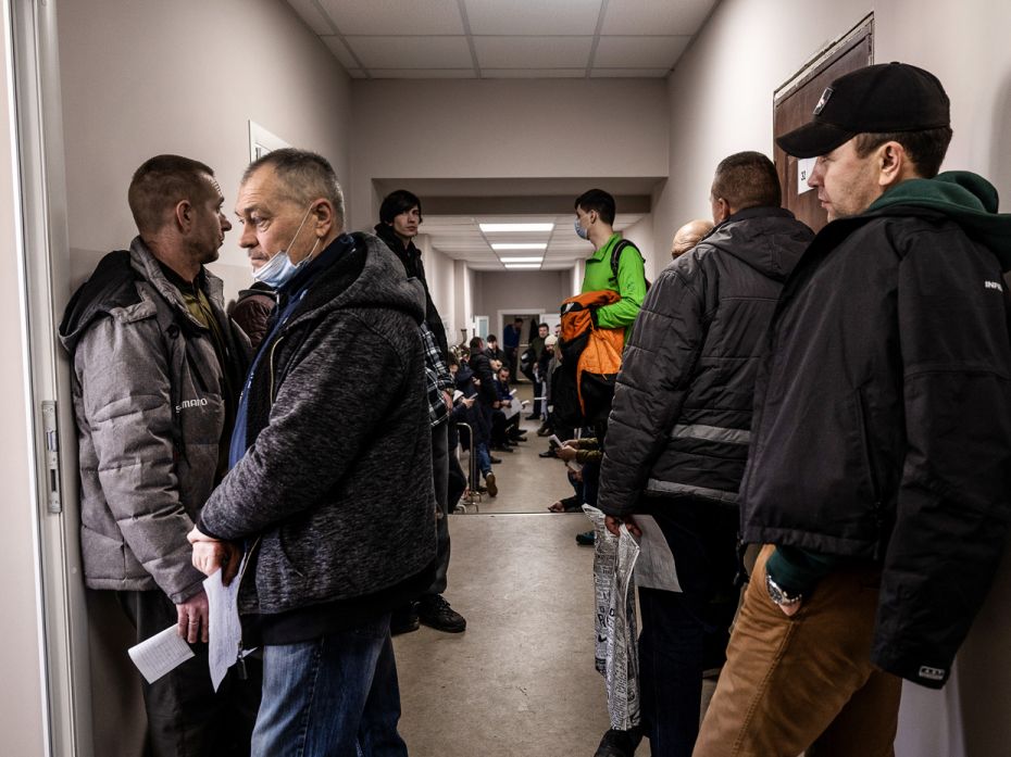 Men line up to register for military service in Kramatorsk, eastern Ukraine, on Thursday, February 2