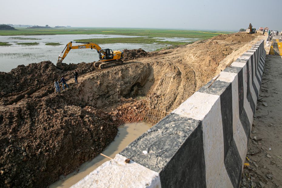 Vehicles on the road to Gorakhpur often veer off onto mud embankments as the work on the Varanasi-Go