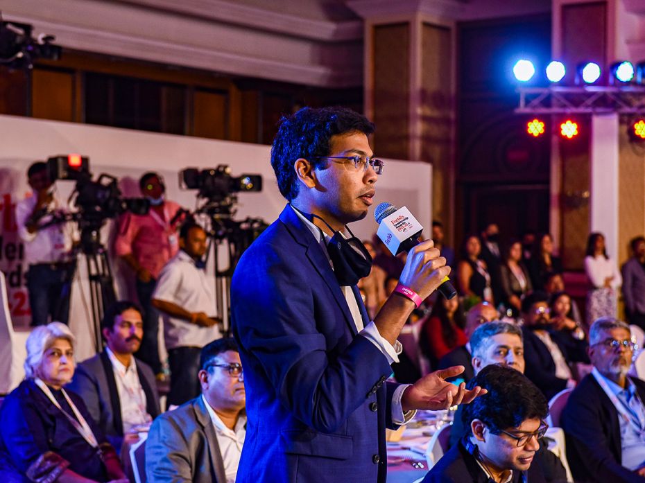 Fluid.Ai founder and CEO Abhinav Aggarwal asks a question to grandmaster Viswanathan Anand in a live