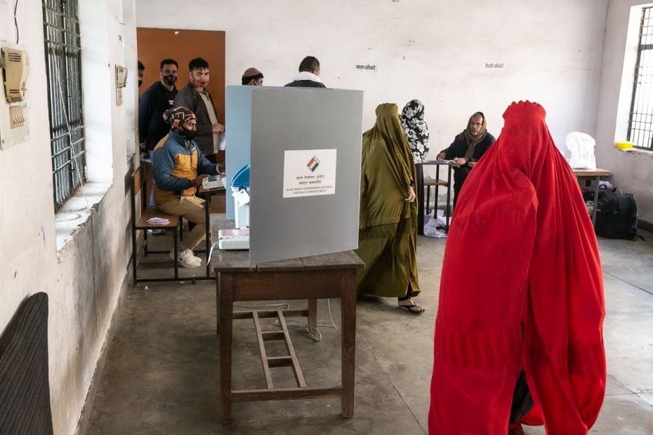 Shamim Hanif from a mohalla in Khail exercises her vote at the polling booth in Shamli. Articulate w