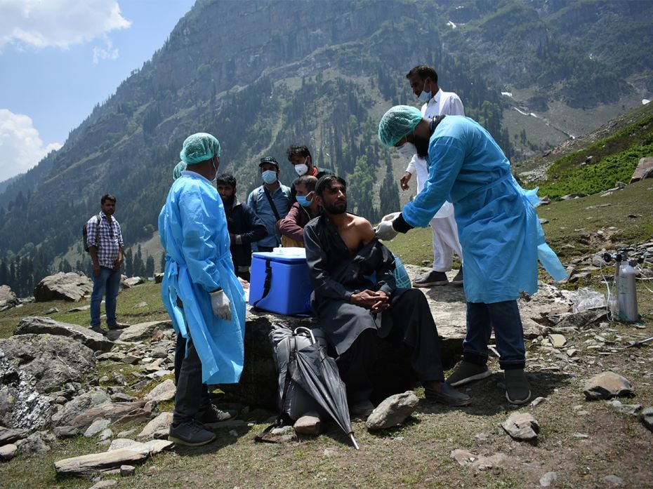 A healthcare worker administers a dose of Covishield, a Covid-19 vaccine manufactured by the Se