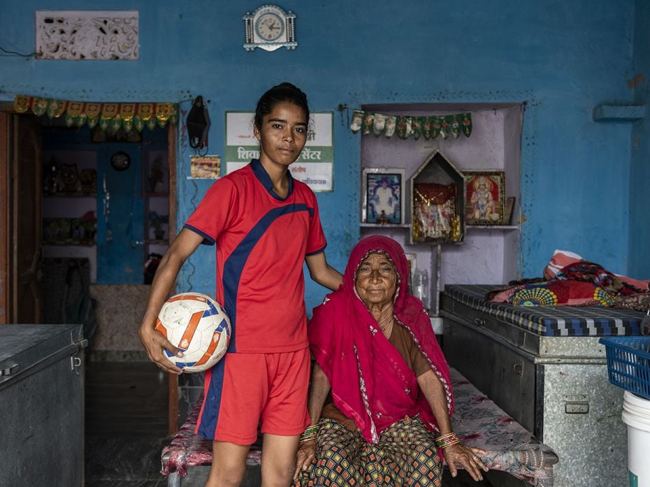 Payal with her grandmother Hagami Prajapati inside their home. Payal happens to be among the handful