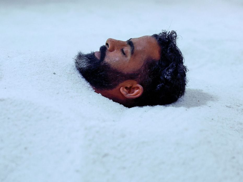 A visitor receives anti-stress treatment in a salt cave rich in negative ions and minerals at the fa