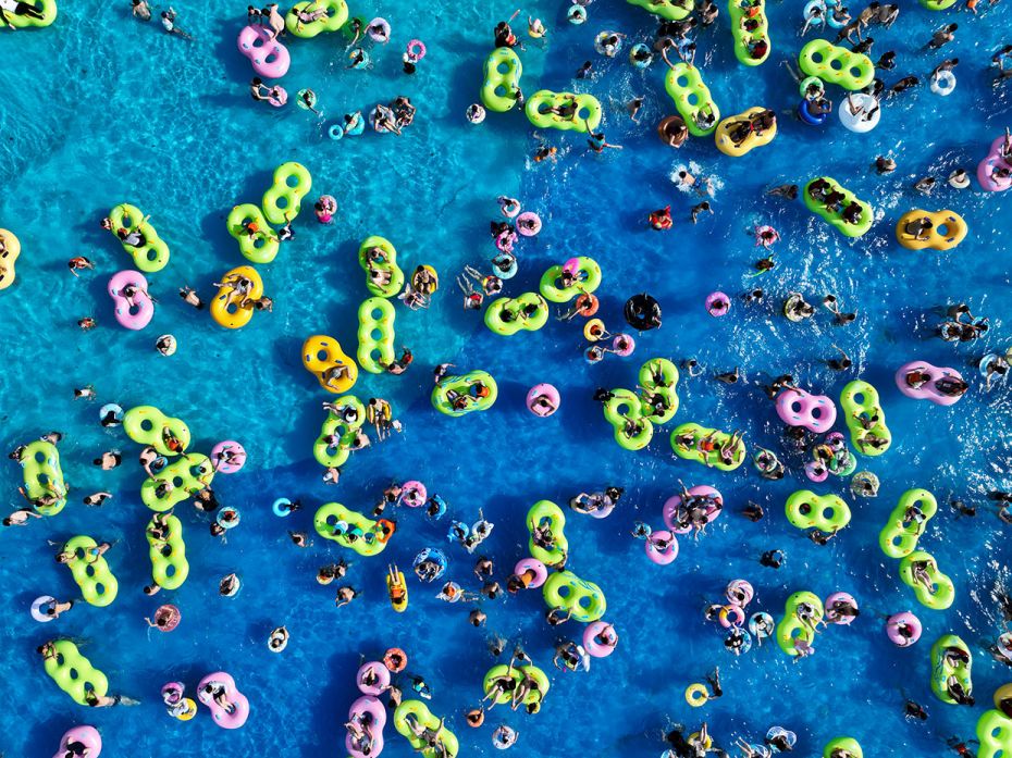 People enjoy themselves at Chongqing Playa Maya Water Park on a hot summer day in Chongqing, China, 