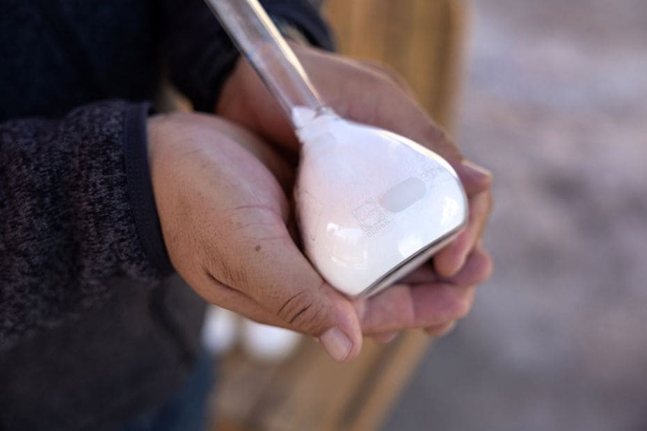 A file photo of a bottle of processed lithium carbonate—a main component in manufacturing batt