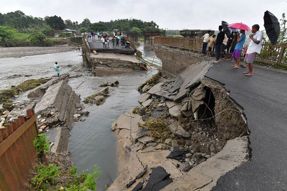 A damaged bridge over the Daranga River after flash floods washed away a section of the bridge follo